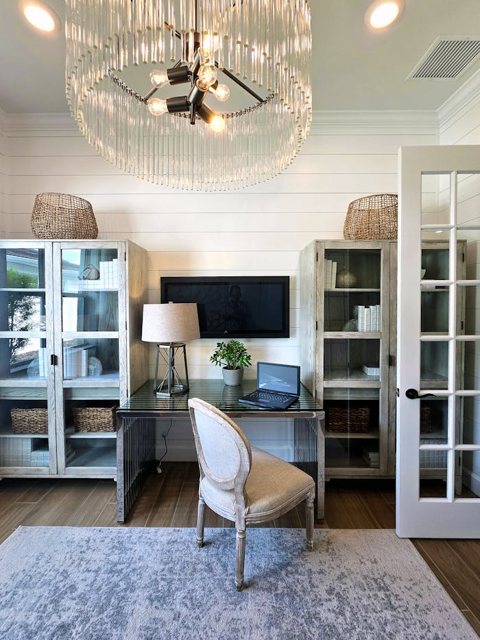 why-choose-us Bright and modern home office setup with chic decor and minimalistic design.